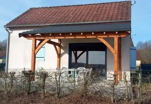 Logement 39 — façade avec pergola